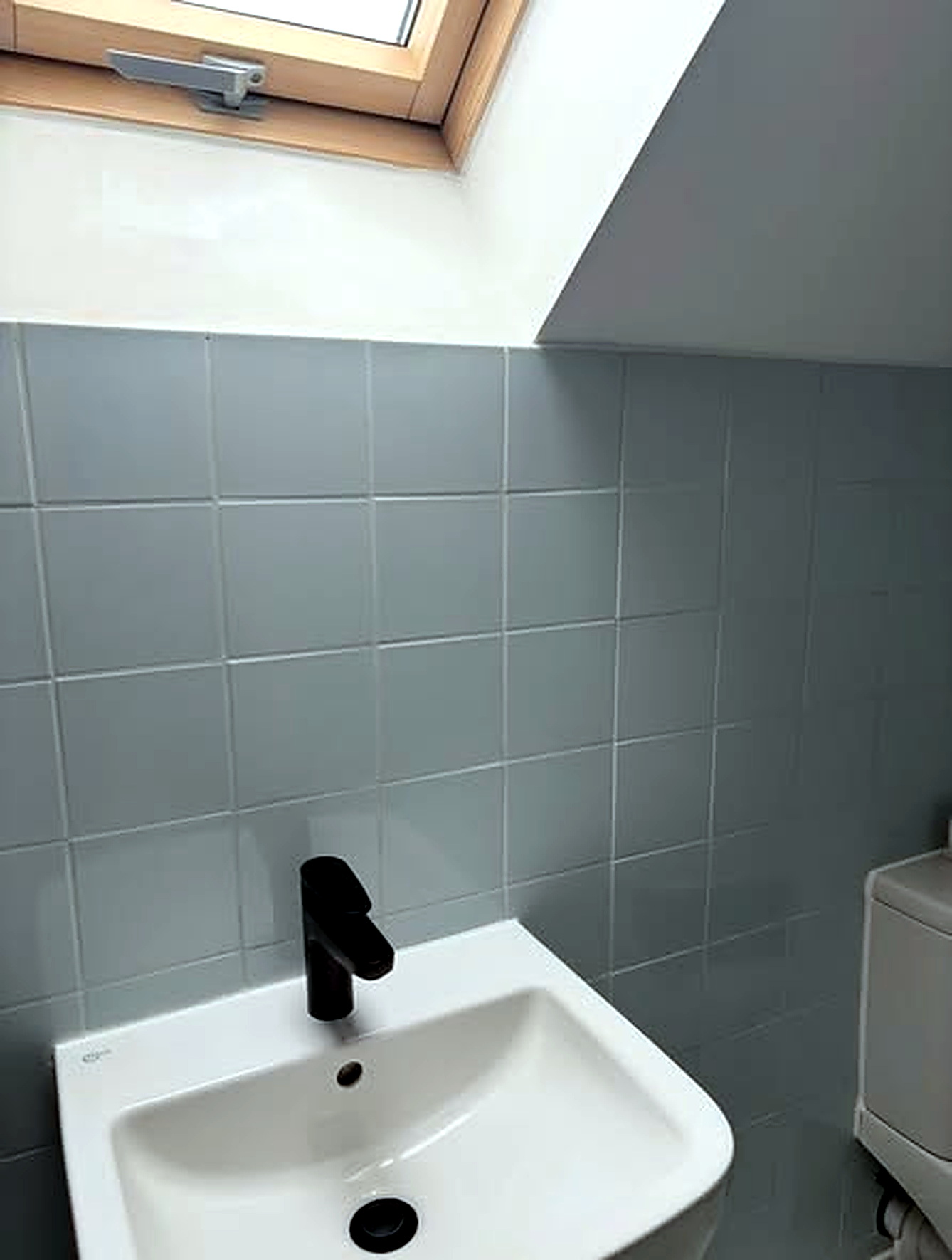 Clean sink and tiled wall